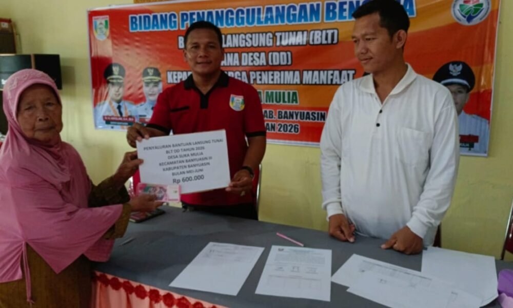 Senyum Bahagia Tujuh KPM Desa Suka Mulia Terima BLT-DD Jelang Idul Adha
